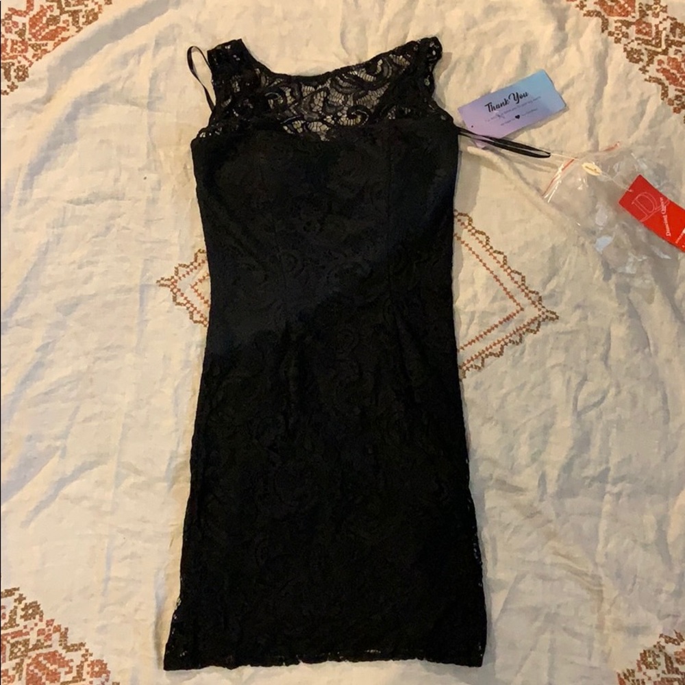 Black lace body con dress